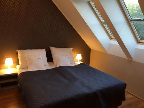 Posteľ alebo postele v izbe v ubytovaní Apartamenty Villa Baltic Sun II i III