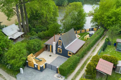 an overhead view of a large house with a yard at Chata Björk in Babice
