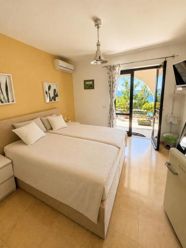 Llit o llits en una habitació de Villa Marijam
