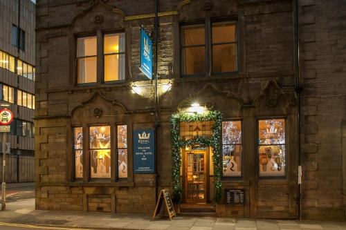 a building with a christmas wreath on the door at The Royal Hotel and Bar in Lancaster