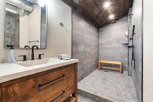 a bathroom with a sink and a shower at Standing Rock Farms in Madison