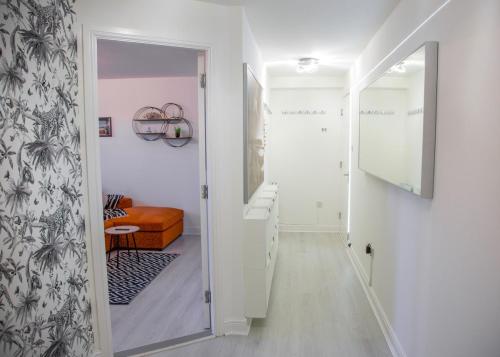 a hallway with a door leading to a room at The Wee Shore House in Ayr