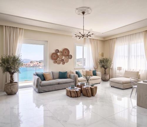 a living room with a couch and a table at Amare boutique Hotel in Salerno Airport - Aeroporto di Salerno