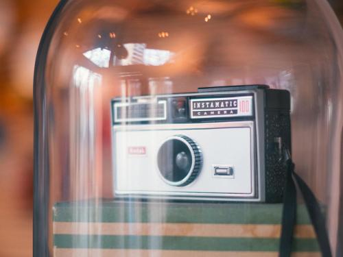 a small camera in a glass jar at Vienna House Easy by Wyndham Berlin Prenzlauer Berg in Berlin