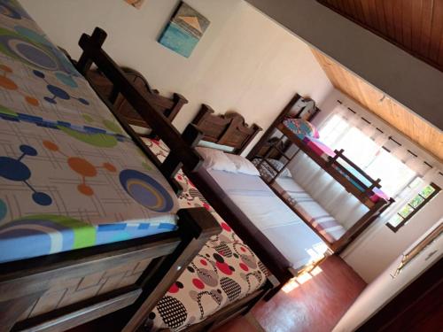 an overhead view of a bedroom with two bunk beds at Casa Rotario Honda in Honda