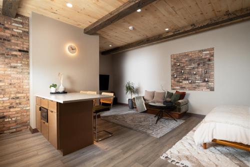 a bedroom with a bed and a desk in a room at Pulaski Point Properties in Chicago