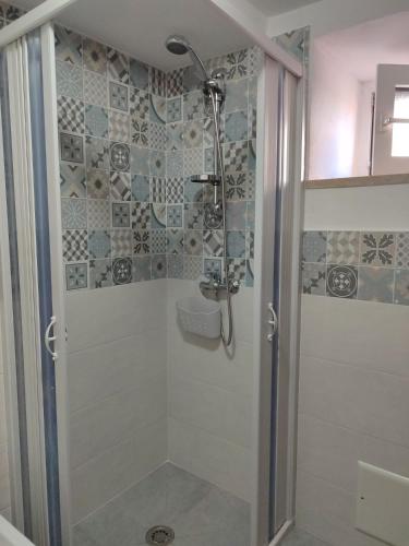 a bathroom with a shower with a sink at Casa Francesca Ponza in Ponza