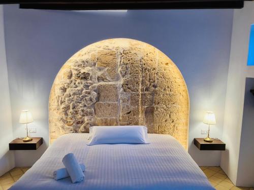 Llit o llits en una habitació de Hostal Pons