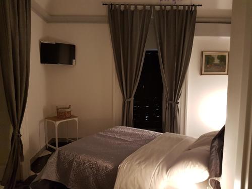 Postel nebo postele na pokoji v ubytování Dimora Dell'Opera