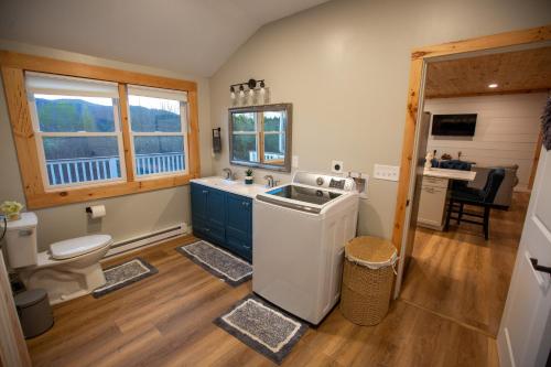a bathroom with a sink and a toilet at Beautiful Bridgton Apartment in Bridgton