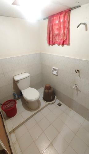 a bathroom being remodeled with a toilet in it at Diva Sunrise beach resort in Dipaculao