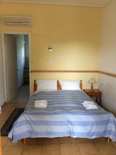 Cama o camas de una habitación en Paradisos Studios