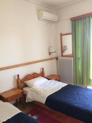 Cama o camas de una habitación en Paradisos Studios