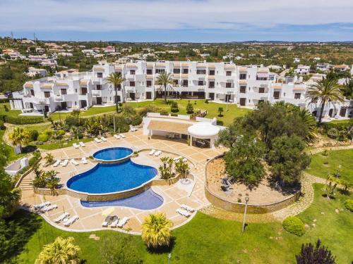 an aerial view of a resort with a swimming pool at Clube Albufeira: 2BR Prime Holidays Retreat in Albufeira