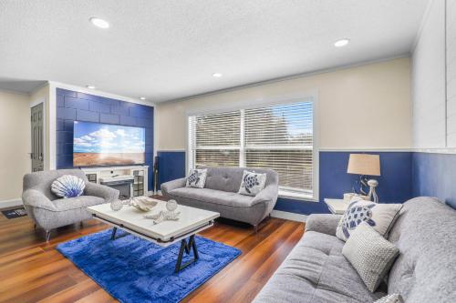 a living room with a couch and a table at 2812 Tulane Dr in Cocoa