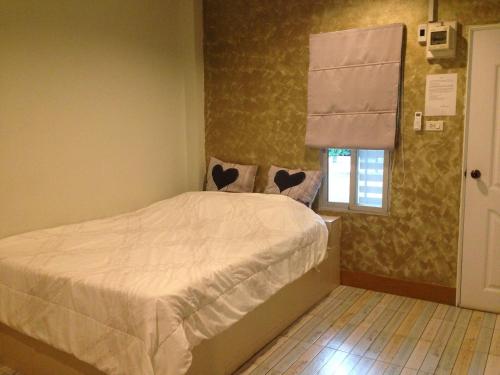Llit o llits en una habitació de Rada Phan