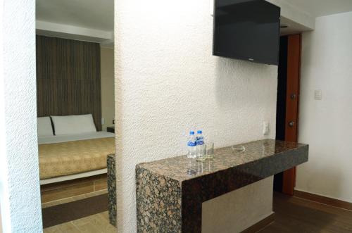 Μια τηλεόραση ή/και κέντρο ψυχαγωγίας στο Hotel Santa Cruz