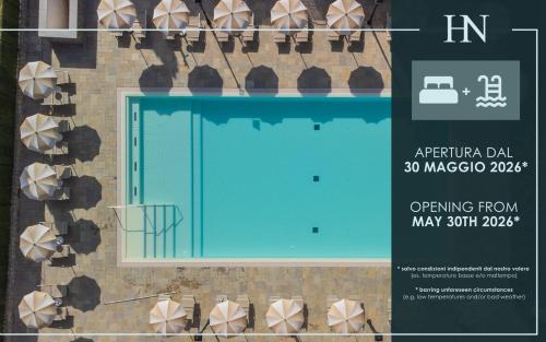 a poster of a swimming pool next to a building at Villa Carobbi Apartments Florence in Florence