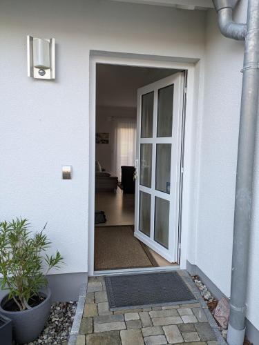 an open door of a house with a hallway at Ferienhaus Frieda mit 2 Schlafzimmern in Sagard