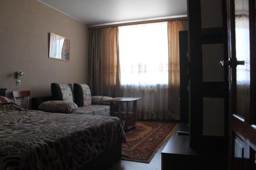 Кровать или кровати в номере Квартиры Калинина 161А