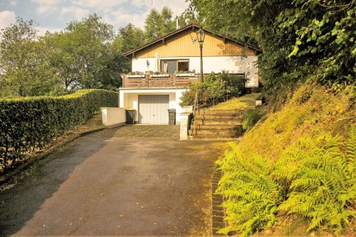 a house with a driveway in front of it at Schöne Aussicht am Eifelsteig in Monschau