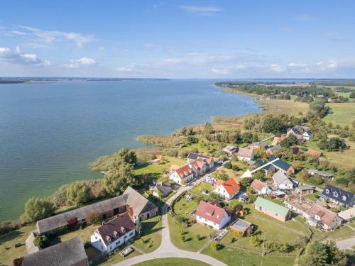 an aerial view of a small village by the water at Ferienhaus DeRuhHus in Rankwitz