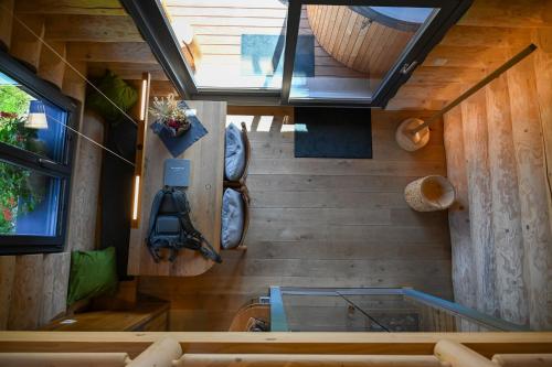 an overhead view of a house with a glass table at Mein Refugium Luxury Tiny House in Unteriberg