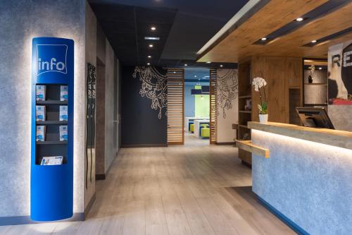 
The lobby or reception area at Ibis Budget Madrid Calle 30
