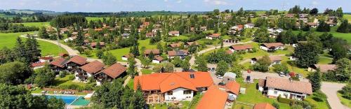 an aerial view of a village with a house at Ferienhaus im Feriendorf Reichenbach B13a in Nesselwang