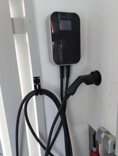 a cell phone is hooked up to a wall at Ferienwohnungen Derx in Bad Wildungen