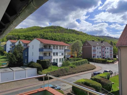 a view of a town with houses and a mountain at Ferienwohnung Harzoase in Bad Harzburg