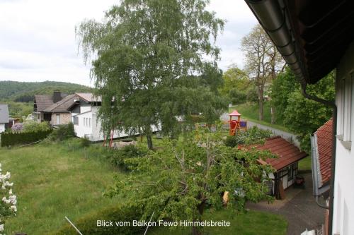 a view of a yard from a house at Ferienwohnung Hamel in Kirchlotheim