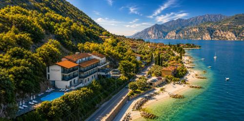 an aerial view of a resort on the shore of a lake at Piccolo Hotel in Malcesine