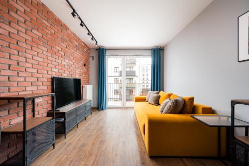 Żerań Brick Loft Apartment by BookingHost