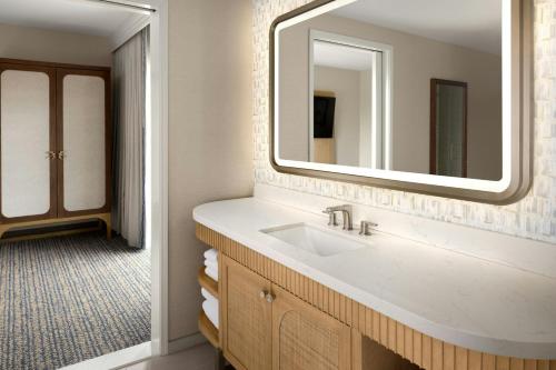 a bathroom with a sink and a mirror at Hotel Solea, Autograph Collection in Carlsbad