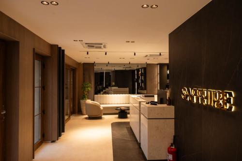 a lobby of a hotel with a waiting room at Sapphire Hotel in Prizren