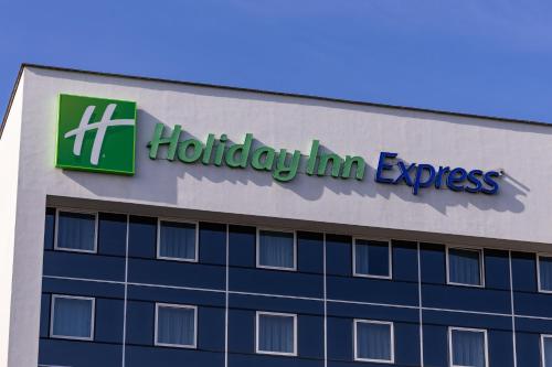 a building with the sign for holiday inn express at Holiday Inn Express Antwerpen City North by IHG in Antwerp