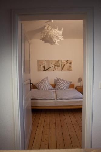 Ένα ή περισσότερα κρεβάτια σε δωμάτιο στο Apartmenthaus Lorbach
