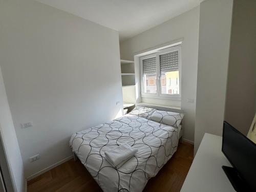 Trilocale Moderno con Terrazzo e Parcheggio