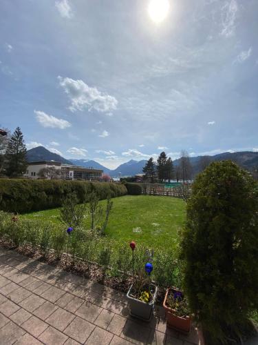 a view of a yard with some plants at Haus St_ Michael_ Ferienwohnung 1_4 in Schliersee