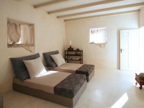 מיטה או מיטות בחדר ב-Monaldesca