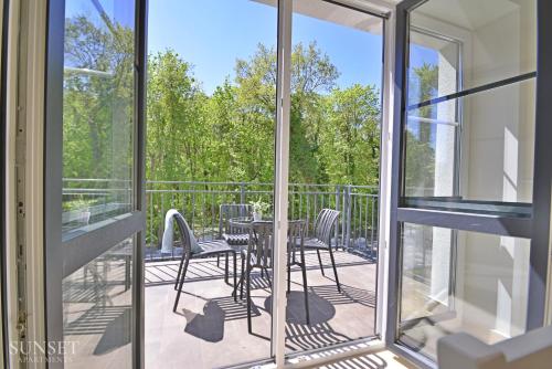 Sunset Apartments - duży i słoneczny balkon - parking - 400m od plaży - zielona okolica