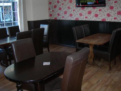 Ein Sitzbereich in der Unterkunft The Swan Hotel