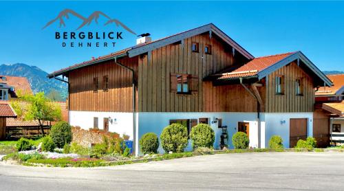 a building with a sign that reads berkeley element at Ferienwohnung Dehnert in Fischbachau