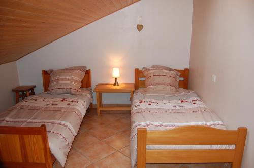 Postel nebo postele na pokoji v ubytování Les écrins d'Autane