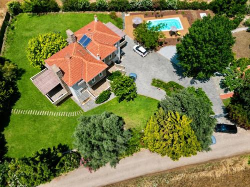 an overhead view of a house with an orange roof at Villa Polyxeni Lavender 150m from the sea in Politika