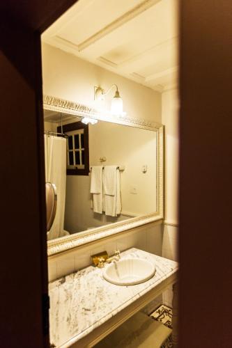 Ванная комната в Hotel Solar do Rosário