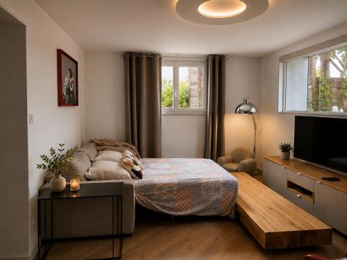 Llit o llits en una habitació de La Maison Bleue