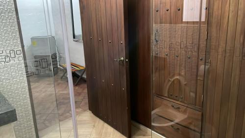a pair of wooden lockers in a room at Hotel Lengerke Barichara in Barichara