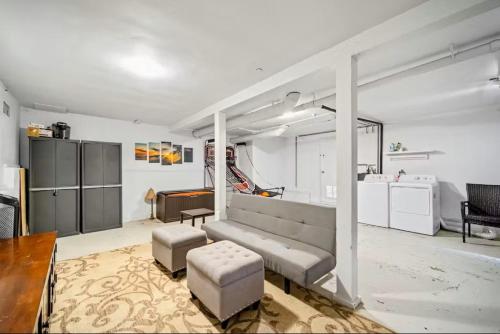 a living room with a couch and a table at Dana Point Lantern District Retreat Beach Close in Dana Point
